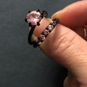Black band, light pink stones ring set